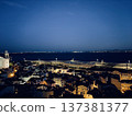 Panorama overlooking the sea and city at night in Europe 137381377