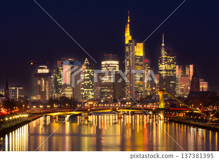 Frankfurt am Main skyline with bridge over Main river at dusk Frankfurt am Main skyline with bridge over Main river at dusk 137381395