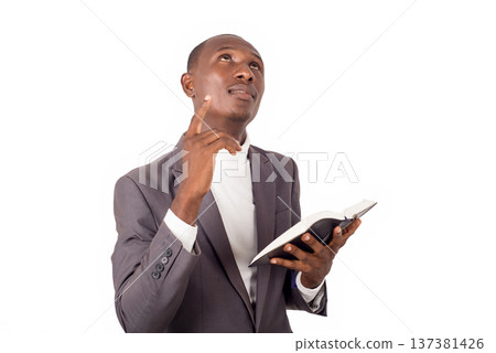 portrait of young man with a Bible in his hand. 137381426