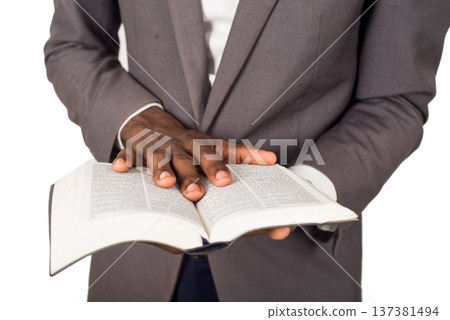 portrait of young man with a Bible in his hand. 137381494