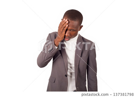 portrait of young man standing in suit. portrait of young man standing in suit. 137381798