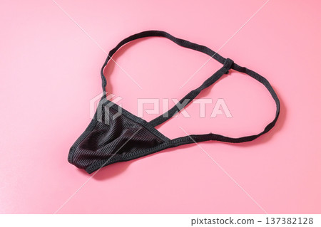 Cosplay women's underwear on color background. Cosplay women's underwear on color background. 137382128