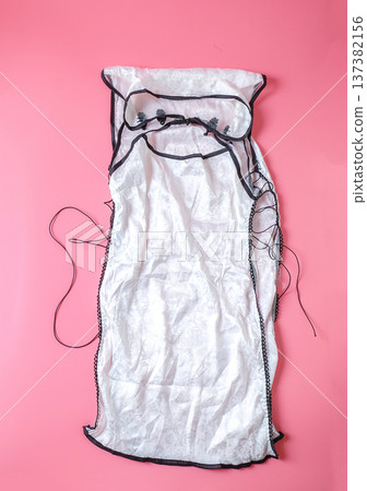 Cosplay women's underwear on color background. Cosplay women's underwear on color background. 137382156
