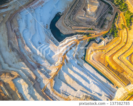Sandstone quarry Strelec is seen from above in Czechia. The quarry shows different layers of sandstone. The area is known for its natural beauty and geological formations. 137382785
