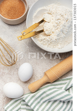 Baking ingredients preparing dough on kitchen counter Baking ingredients preparing dough on kitchen counter 137383015