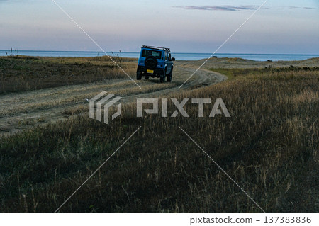 Off-road vehicle heading to the sea 137383836