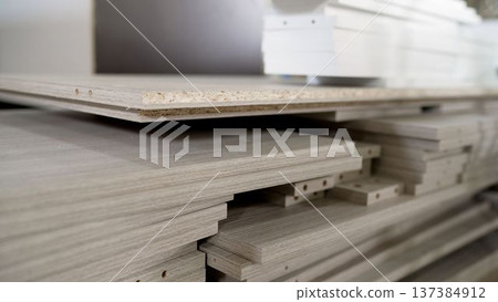Close-up of stacked laminated particle boards for furniture manufacturing. 137384912