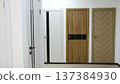 Variety of modern interior doors on display in a home improvement store showroom. 137384930