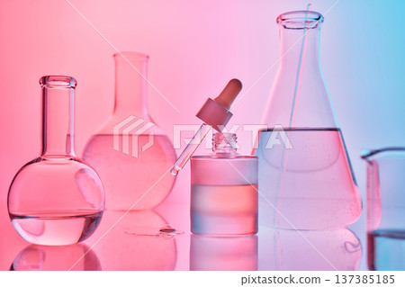 Scientific laboratory glassware preparing beauty skincare serum 137385185