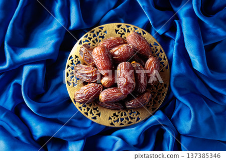 Dates on a golden platter. Dates on a golden platter. 137385346