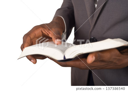 portrait of young man with a Bible in his hand. 137386540
