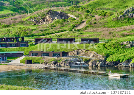 The nature of the Khasansky district of Primorsky Krai, Russia. The lip of the Teal of the Slavic Bay, the inner bay of Peter the Great in the summer. 137387131