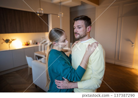 Worried husband keeping silent hiding cheating affair from wife, mistrust and betrayal in marriage. 137387290