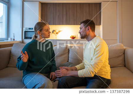 Frustrated wife fed up with lies about cheating affair from guilty husband, quarrel over betrayal. Frustrated wife fed up with lies about cheating affair from guilty husband, quarrel over betrayal. 137387296