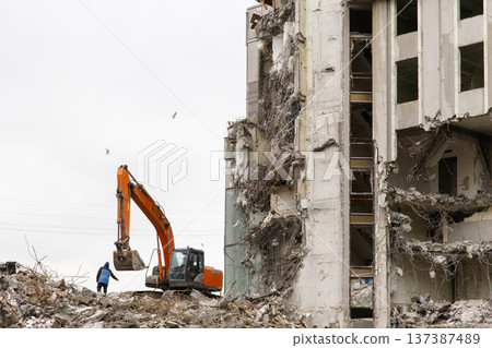 Building demolition with special excavator-destroyers Building demolition with special excavator-destroyers 137387489