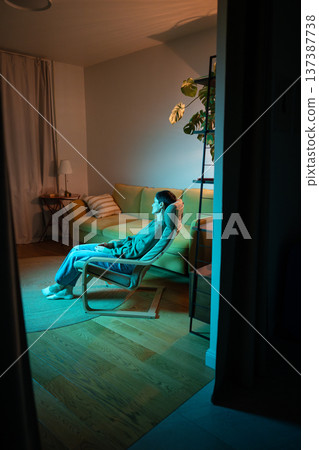 Tired tranquil senior woman sleeping in chair in room, life problems taking away energy and strength 137387738