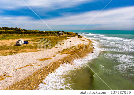 Caravan trailer camping on coast. Aerial view 137387939