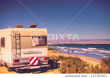 Camper with ladder and broken window 137387971
