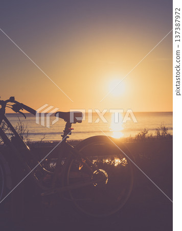 Bicycle on beach, active lifestyle. 137387972