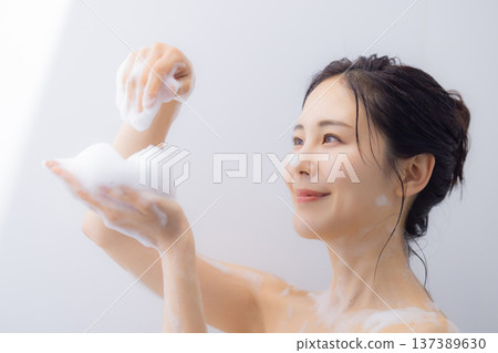 Women washing their body with body soap 137389630