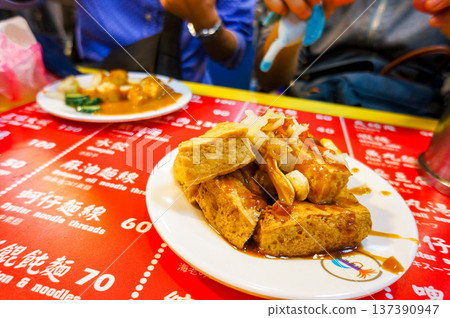 Stinky tofu at a Taiwanese night market Stinky tofu at a Taiwanese night market 137390947