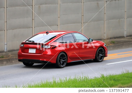Red domestic sports car 137391477