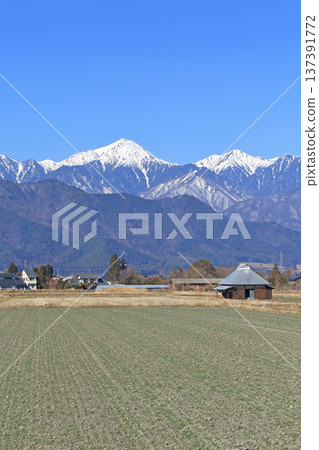 Azumino in early spring: countryside and the Northern Alps Azumino in early spring: countryside and the Northern Alps 137391772