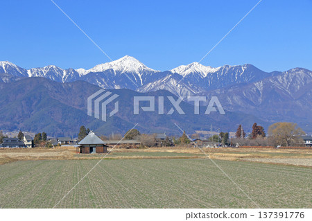 Azumino in early spring: countryside and the Northern Alps Azumino in early spring: countryside and the Northern Alps 137391776