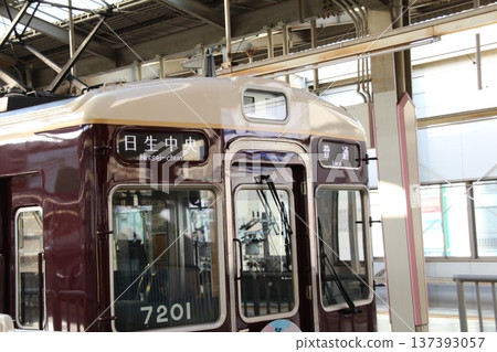 A local train bound for Nissei Chuo stops at Kawanishi-Noseguchi Station on the Nose Electric Railway A local train bound for Nissei Chuo stops at Kawanishi-Noseguchi Station on the Nose Electric Railway 137393057