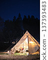Pitched tents at a campsite at night 137393483