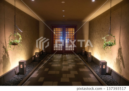 Hotel gate with hanging tree on basket at night, Kurokawa onsen Hotel gate with hanging tree on basket at night, Kurokawa onsen 137393517