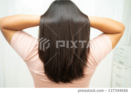 Woman with beautiful shine hair care treatment. Woman with beautiful shine hair care treatment. 137394686