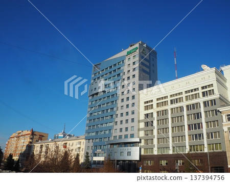 Russia Chelyabinsk Revolution Square Soviet architecture and blue sky Russia Chelyabinsk Revolution Square Soviet architecture and blue sky 137394756