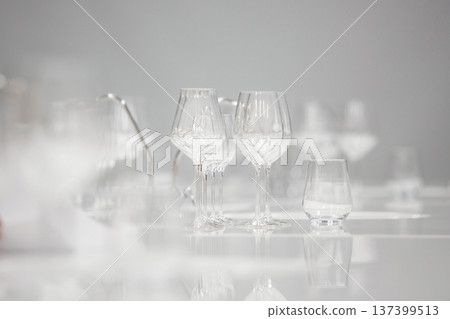 Empty wine glasses on table over white background. Service and restaurants, serving dishes. 137399513