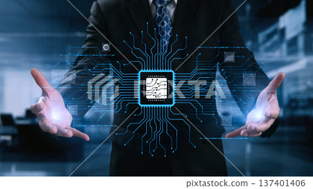 Businessman Presenting Digital Circuit Board with Microchip Graphic Against Futuristic Background in Modern Office Environment. Qubit Businessman Presenting Digital Circuit Board with Microchip Graphic Against Futuristic Background in Modern Office Environment. Qubit 137401406