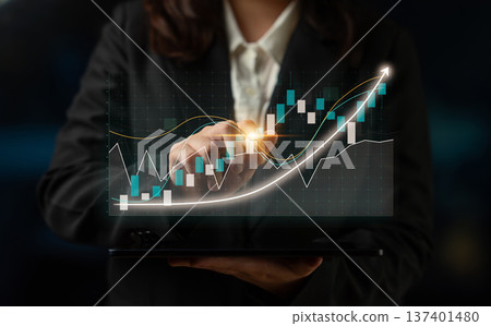 Business professional analyzing data trends with digital graph on tablet, showcasing growth and financial success in modern technology environment Impute Business professional analyzing data trends with digital graph on tablet, showcasing growth and financial success in modern technology environment Impute 137401480