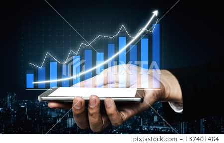 Business Growth and Success Concept with Smartphone and Rising Graph Overlay at Night City Background Impute Business Growth and Success Concept with Smartphone and Rising Graph Overlay at Night City Background Impute 137401484