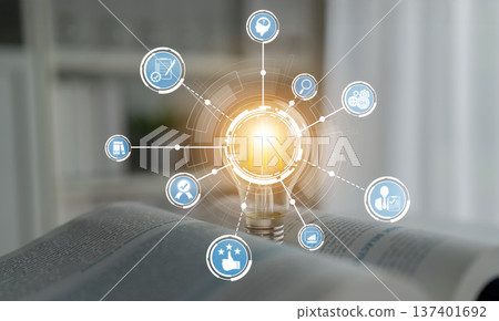 Conceptual digital illustration depicting light bulb with icons representing ideas, knowledge, creativity, and innovation on a blurred background of open book. Crux Conceptual digital illustration depicting light bulb with icons representing ideas, knowledge, creativity, and innovation on a blurred background of open book. Crux 137401692
