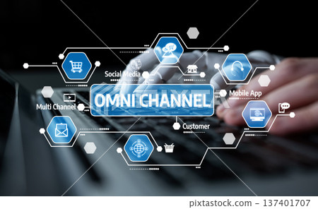 Hands Typing on Laptop with Omni Channel Concept Illustrating Digital Marketing Strategy and Customer Engagement across Various Platforms and Devices. Tessel Hands Typing on Laptop with Omni Channel Concept Illustrating Digital Marketing Strategy and Customer Engagement across Various Platforms and Devices. Tessel 137401707