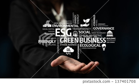 Businessperson presenting ESG concepts related to environmental sustainability, social responsibility, and ethical governance in a modern corporate setting. Tessel 137401708