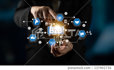 Business professional showcasing innovative B2B strategies with digital icons representing e-commerce and agreements in a modern corporate environment. Tessel Business professional showcasing innovative B2B strategies with digital icons representing e-commerce and agreements in a modern corporate environment. Tessel 137401716