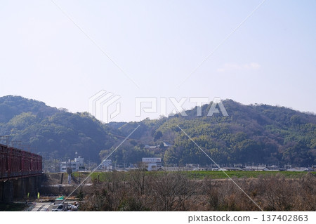 Yawata City, Kyoto: Otokoyama, Jinnoji Temple, Iwashimizu-Hachimangu Station, and the Kizugawa Bridge (from the Kizugawa River embankment) (Early Spring) Yawata City, Kyoto: Otokoyama, Jinnoji Temple, Iwashimizu-Hachimangu Station, and the Kizugawa Bridge (from the Kizugawa River embankment) (Early Spring) 137402863