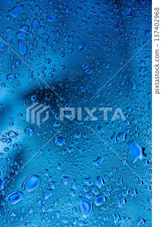 Abstract light blue frosted glass texture with water droplets background Abstract light blue frosted glass texture with water droplets background 137402968
