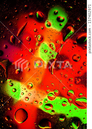 Abstract red and green oil bubbles on water surface macro texture Abstract red and green oil bubbles on water surface macro texture 137402971