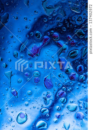 Bright blue water splash background with bubbles and liquid texture Bright blue water splash background with bubbles and liquid texture 137402972