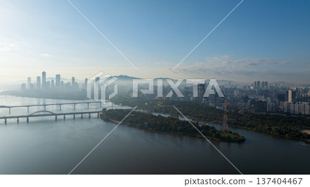 Aerial cinematic sunrise over Seonyudo Park and Hangang River with Yeouido skyline, Seoul. 137404467