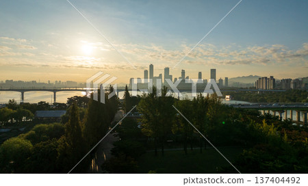 Aerial cinematic sunrise over Seonyudo Park and Hangang River with Yeouido skyline, Seoul. 137404492