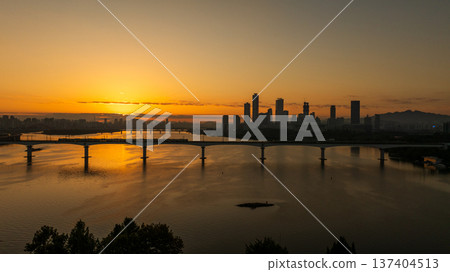 Aerial cinematic sunrise over Seonyudo Park and Hangang River with Yeouido skyline, Seoul. 137404513