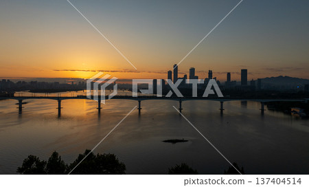 Aerial cinematic sunrise over Seonyudo Park and Hangang River with Yeouido skyline, Seoul. 137404514
