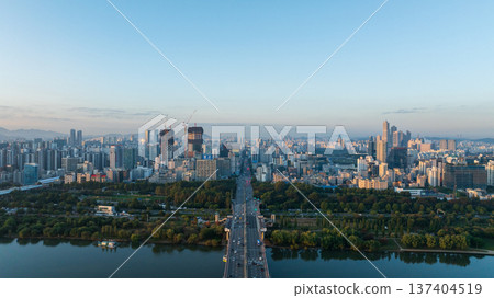 Aerial cinematic sunrise over Seonyudo Park and Hangang River with Yeouido skyline, Seoul. 137404519